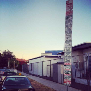 Illustration for article titled Most Ridiculous Parking Sign Ever Has Been Cut In Half, Still Ridiculous